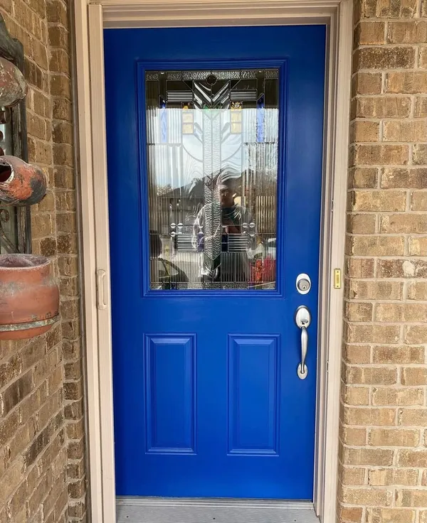 Front door painted royal blue by Sarah